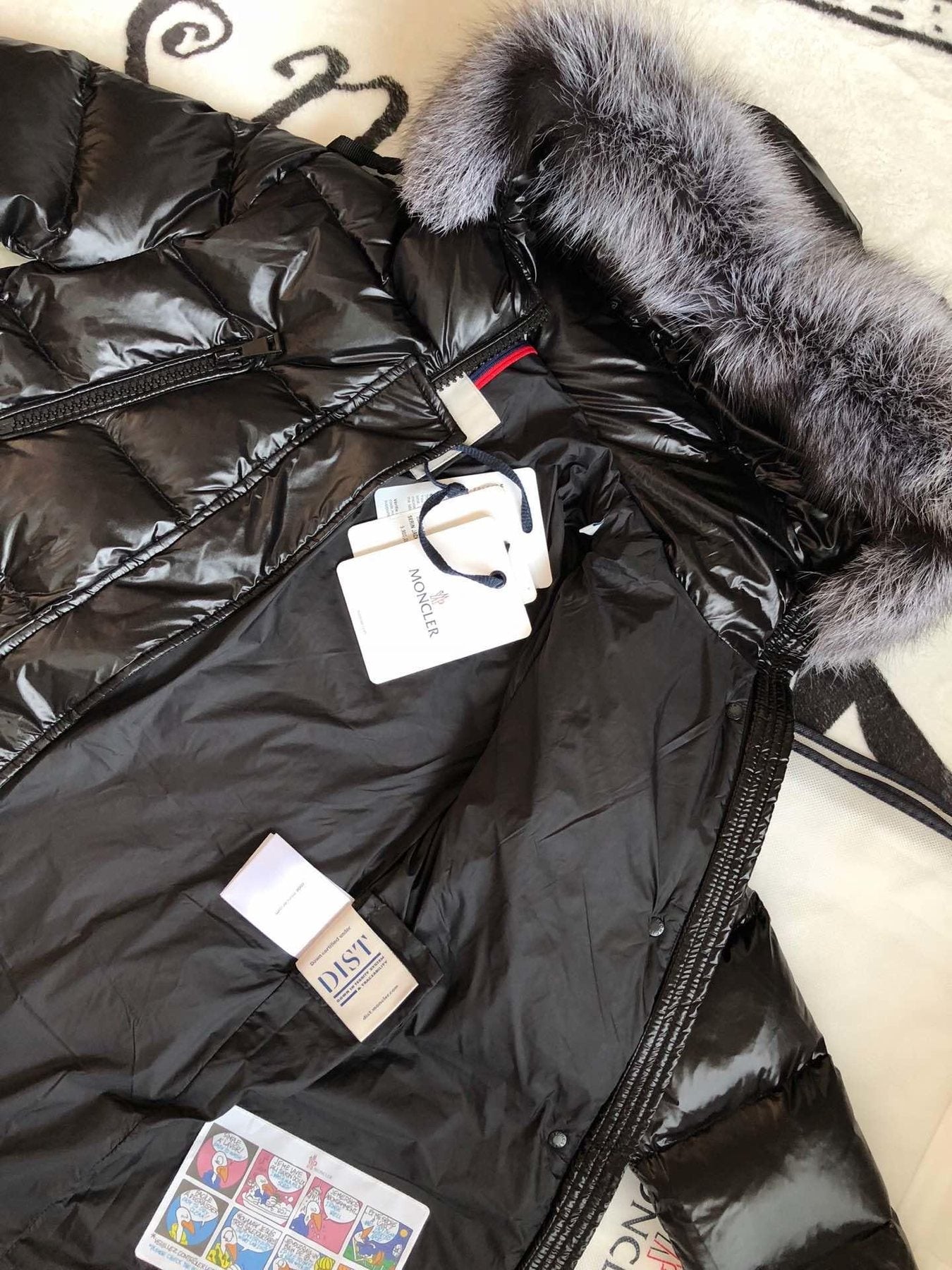 Moncler Hooded Long Puffer Coat — hang_tag