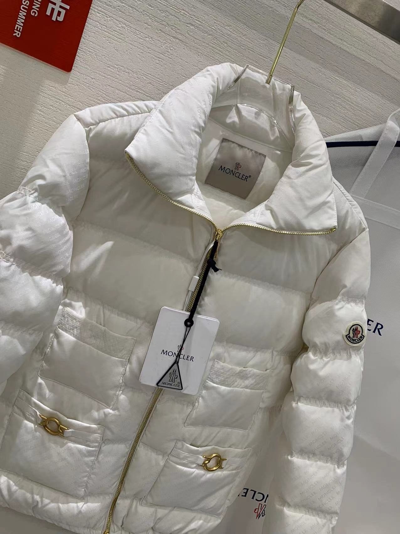 Moncler Multi-Pocket Quilted Puffer Coat — detail