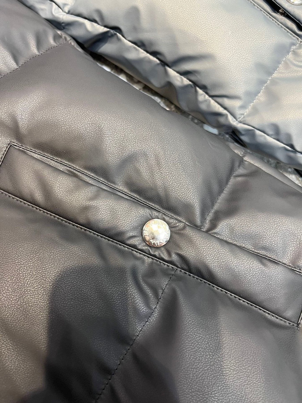 Prada Triangle Badge Padded Vest — detail