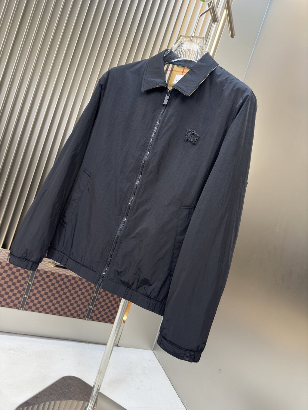 Moncler Black Zip-Front Jacket with Checked Lining — front
