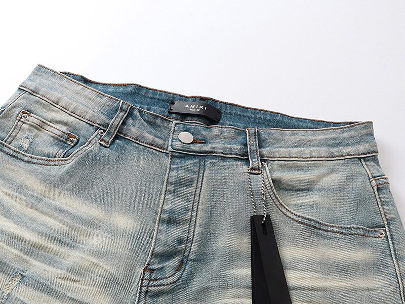 AMIRI Light Blue Monogram Denim Shorts — detail