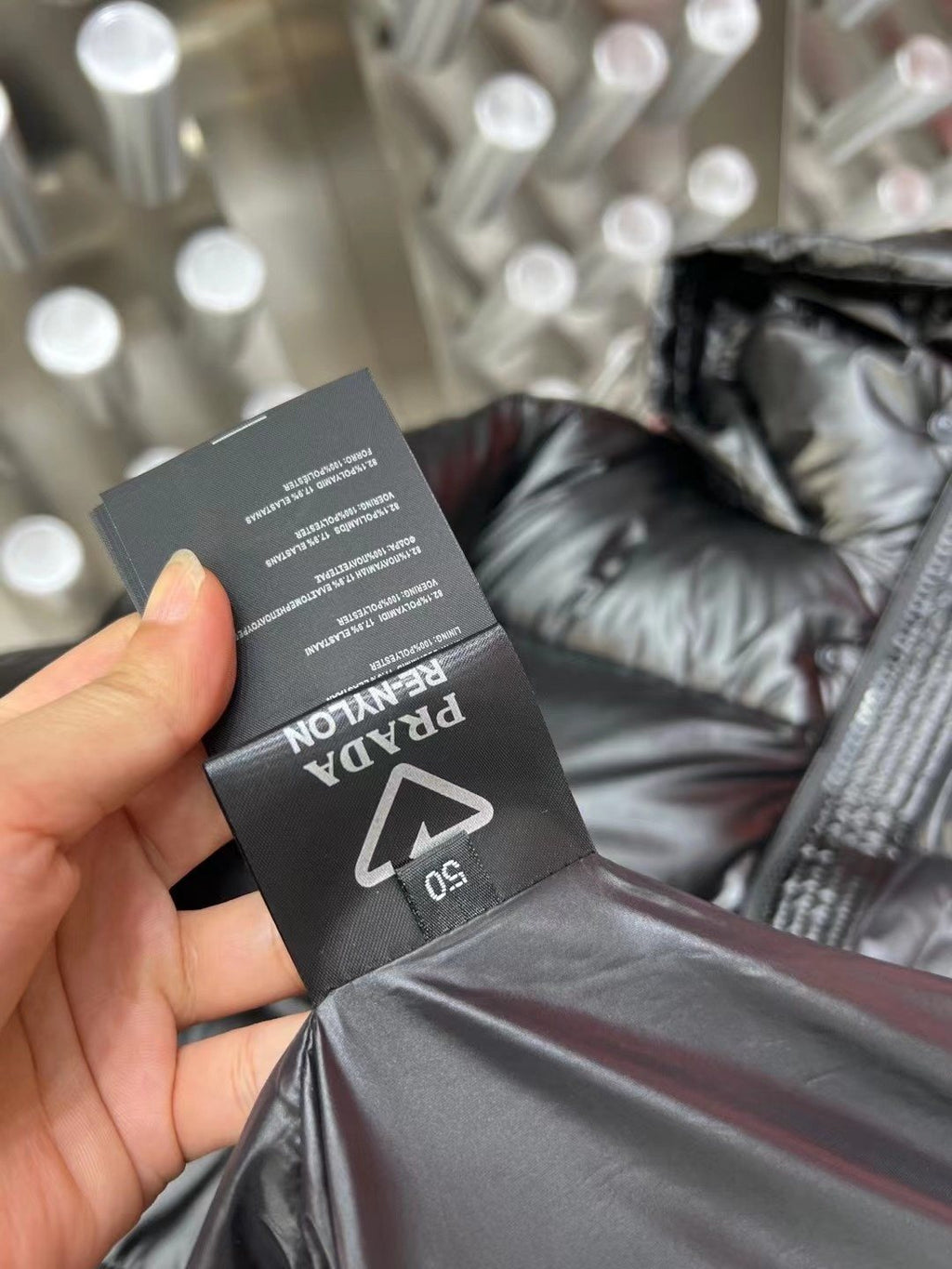Prada Black Hooded Glossy Quilted Puffer Jacket — hang_tag